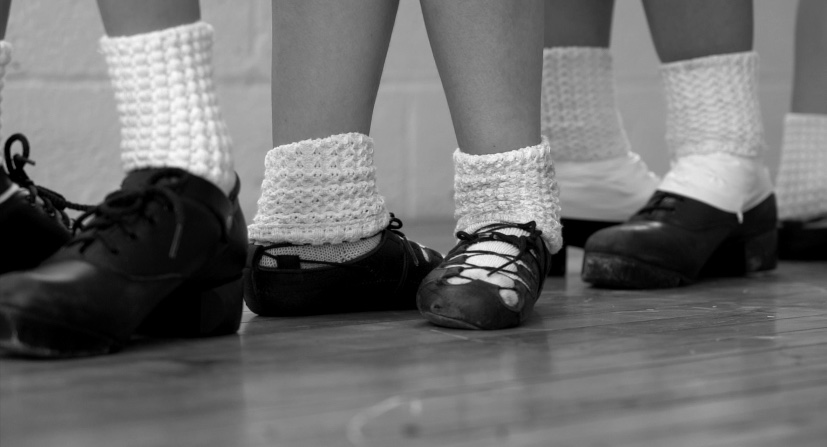 irish dancers' feet standing in a line